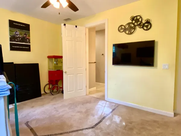 a house that has a tree in front of it