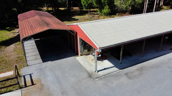 a view of hallway with wooden floor