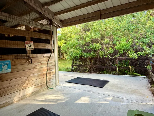 a view of backyard with green space