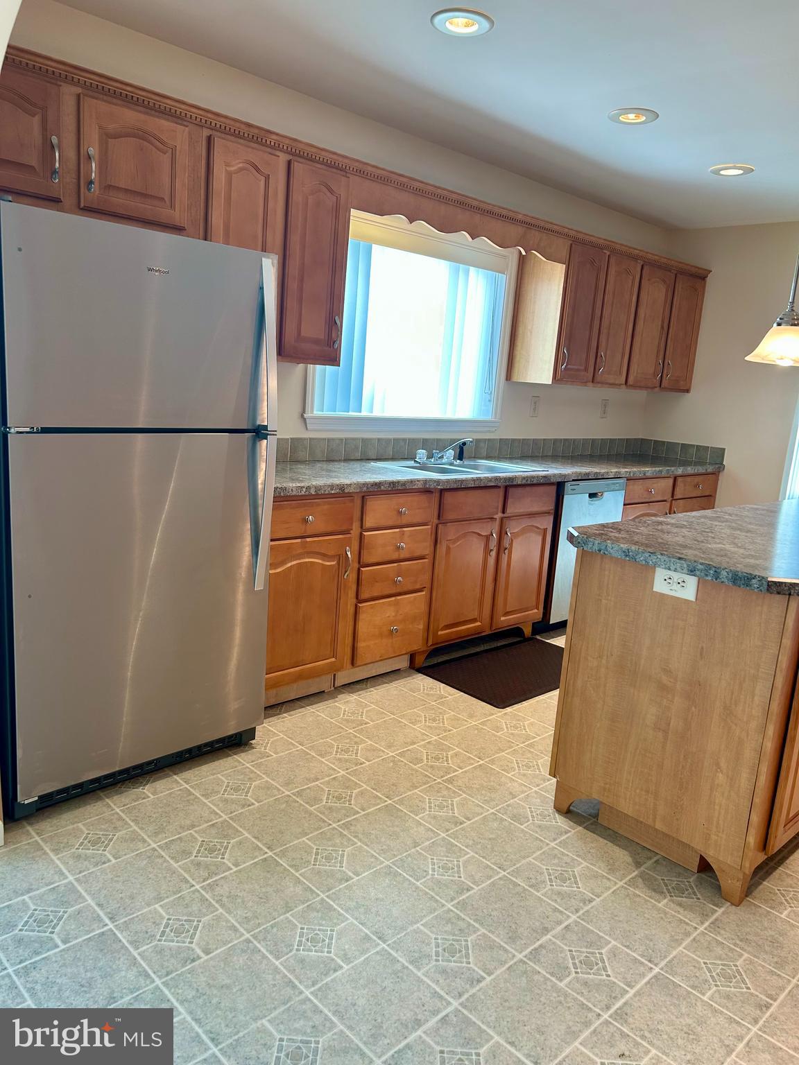 5 Reid Drive Nottingham, PA 19362 - Photo 17 of 23 a kitchen with stainless steel appliances granite countertop a refrigerator a sink and a stove