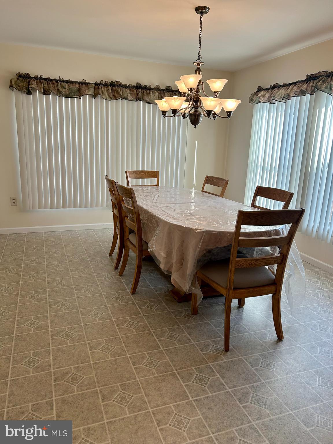 5 Reid Drive Nottingham, PA 19362 - Photo 19 of 23 a dining room with furniture and a chandelier