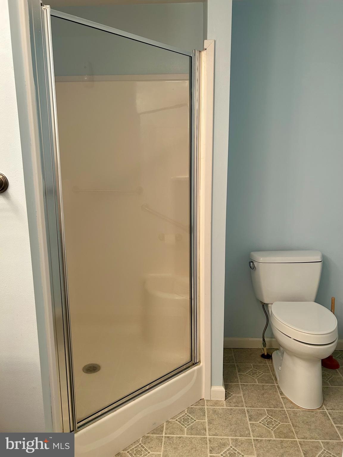 5 Reid Drive Nottingham, PA 19362 - Photo 8 of 23 a bathroom with a glass door shower