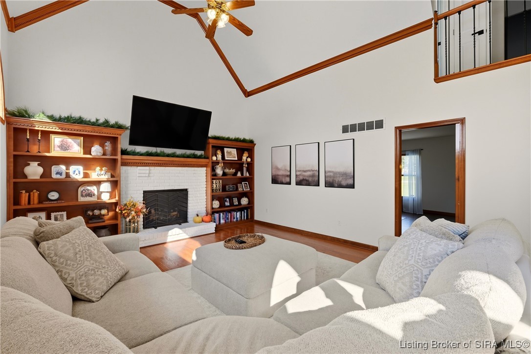6903 Scottsville Navilleton Road Floyds Knobs, IN 47119 - Photo 19 of 44 Fireplace in living room with vaulted ceilings