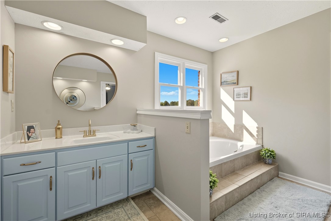 6903 Scottsville Navilleton Road Floyds Knobs, IN 47119 - Photo 28 of 44 Primary ensuite bathroom has separate vanities