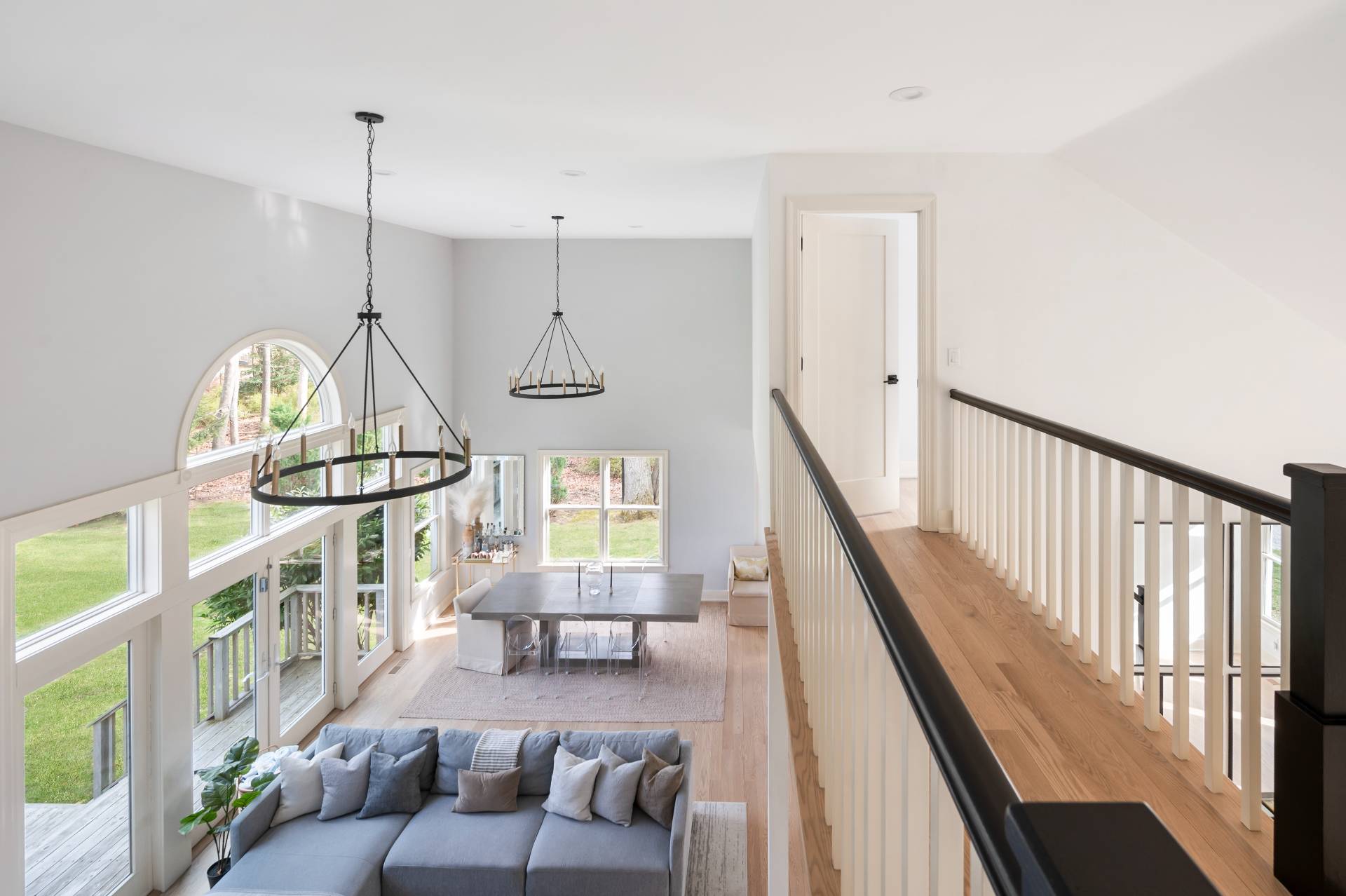 40 Dinah Rock Road Shelter Island, NY 11964 - Photo 18 of 29 a living room with furniture and a wooden floor