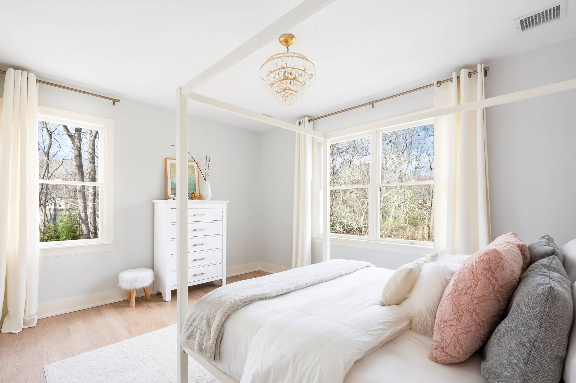 40 Dinah Rock Road Shelter Island, NY 11964 - Photo 21 of 29 a bedroom with a bed a dresser and a window
