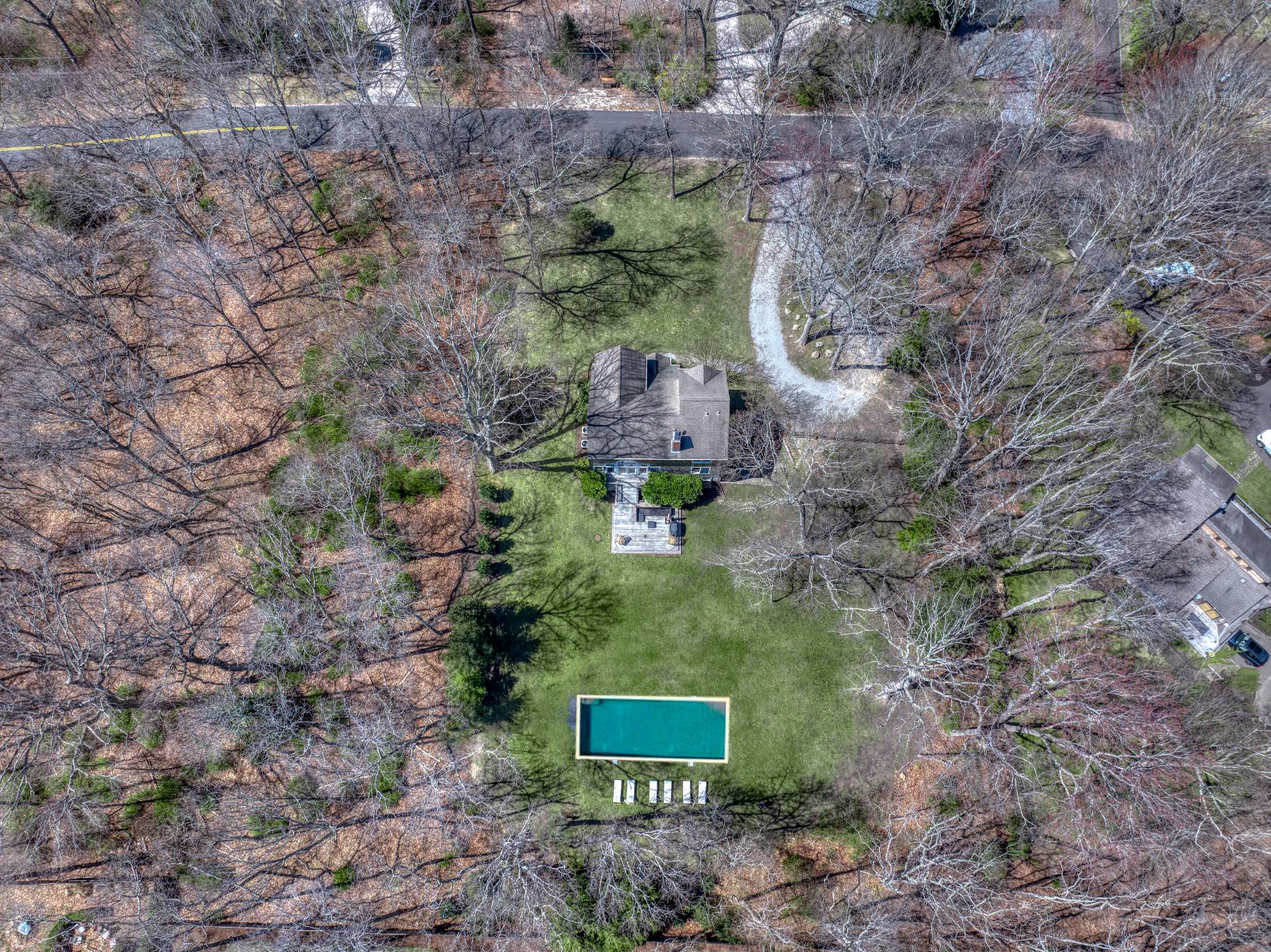 40 Dinah Rock Road Shelter Island, NY 11964 - Photo 28 of 29 a aerial view of a house with a yard