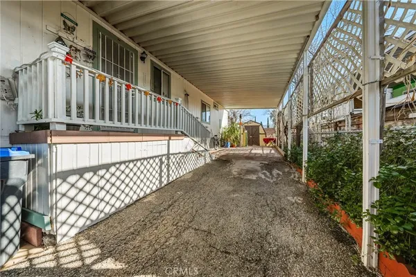 a view of entryway with wooden stairs