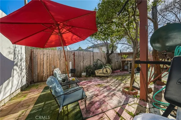 a view of yard with patio