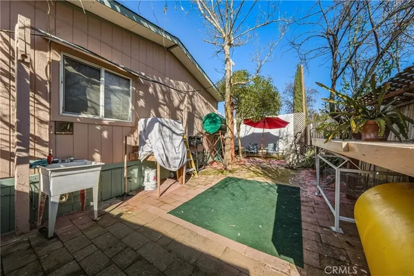 a view of outdoor space yard deck patio and fire pit