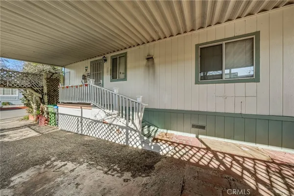 a view of backyard with a small cabin