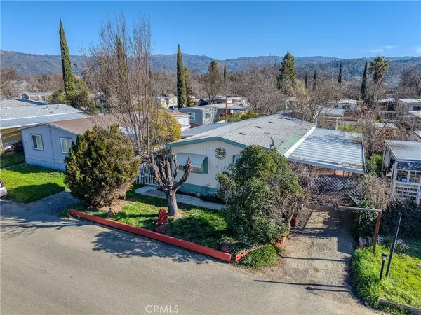 a view of a street with a building in the background