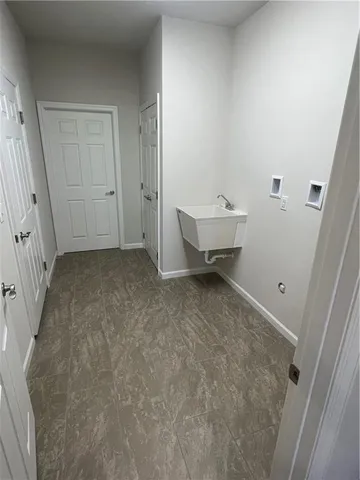 a view of a room with racks on the wall