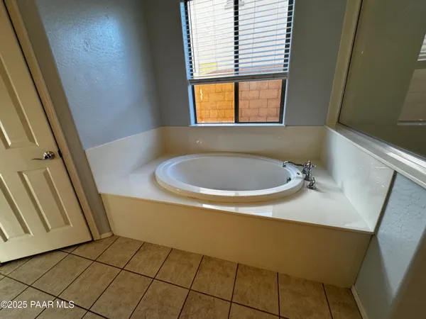 a bathroom with a sink and a bathtub