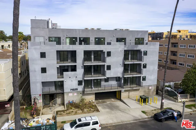 a view of city with tall buildings