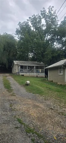 a view of house with outdoor space