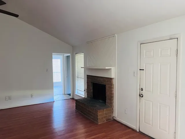 a kitchen with granite countertop a stove and a sink