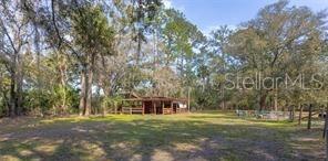 651 Old Haw Creek Road Bunnell, FL 32110 - Photo 18 of 28 a view of a park with large trees