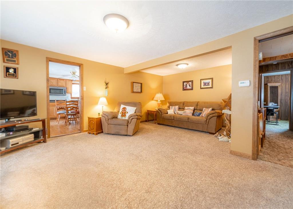 290 Schlemmer Road Rural Valley, PA 16249 - Photo 6 of 25 a living room with furniture and a flat screen tv