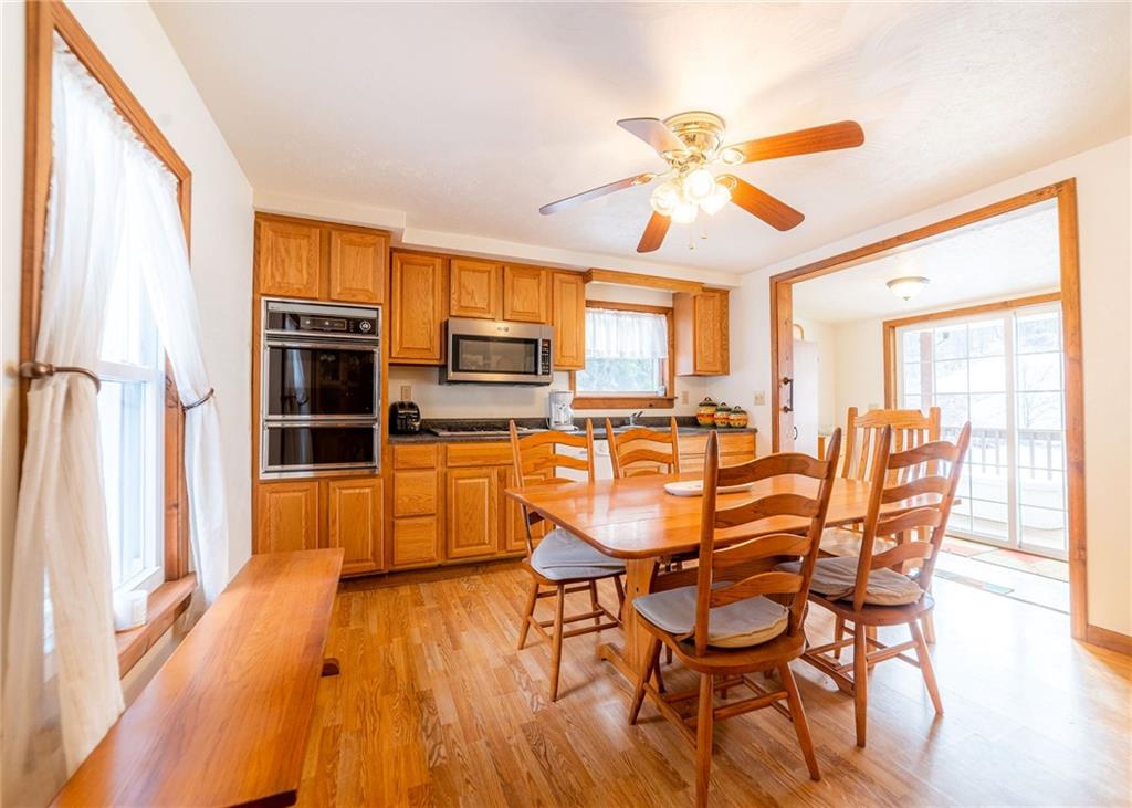 290 Schlemmer Road Rural Valley, PA 16249 - Photo 8 of 25 a view of a dining room with furniture window and wooden floor