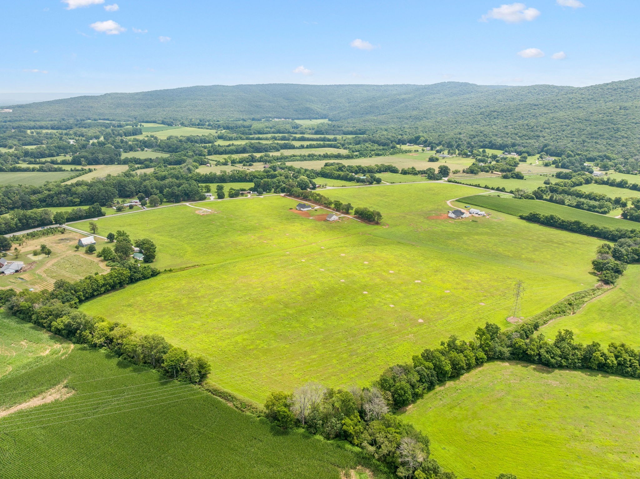 a view of an ocean and a yard