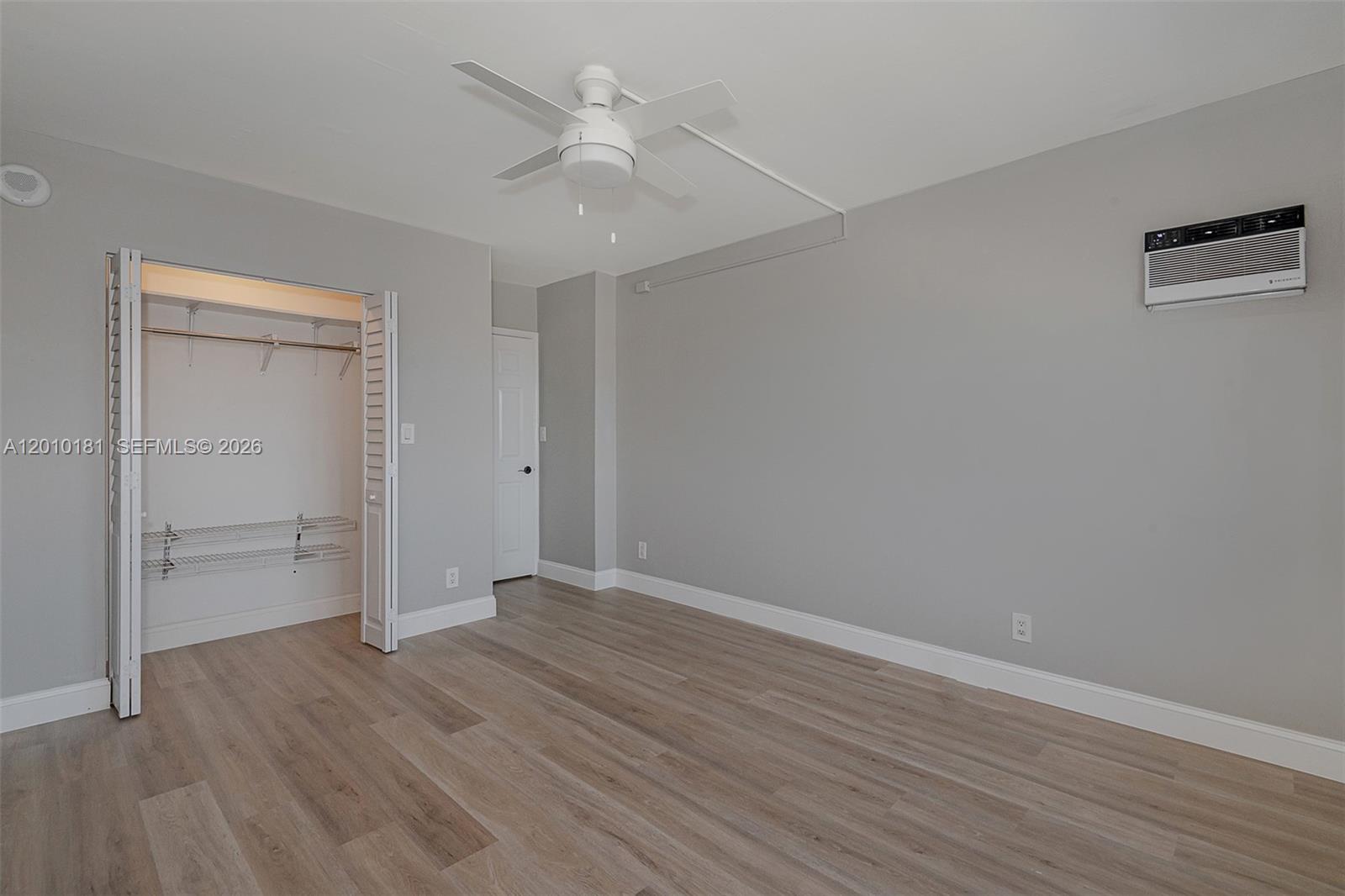 200 South Birch Road, Unit 604 Fort Lauderdale, FL 33316 - Photo 18 of 35 a view of an empty room with wooden floor