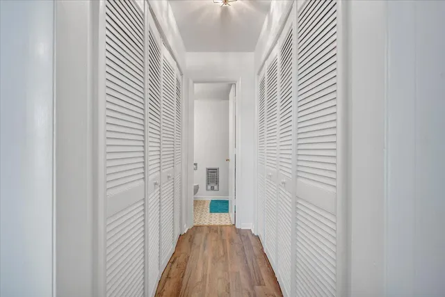 a view of a bedroom from a hallway