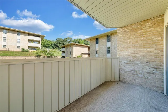 a balcony view with a sink