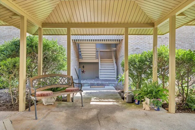 a view of a pathway gate of the house