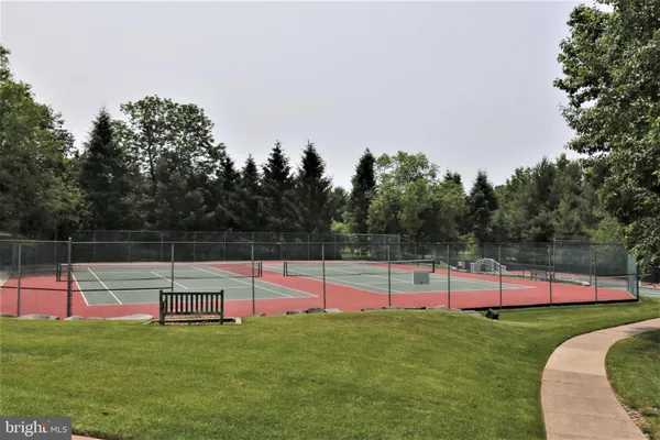 a view of park with large trees and a big yard