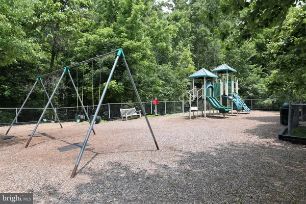 a view of outdoor space with trampoline