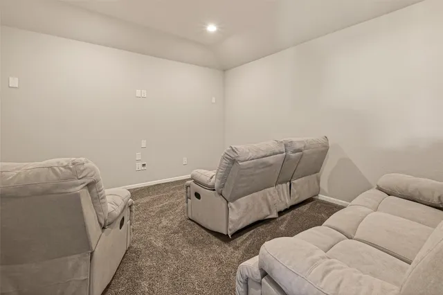 a living room with furniture and a couch