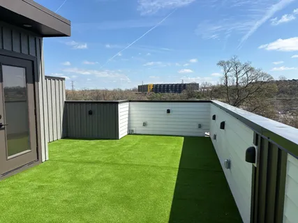 a view of a garden from a balcony
