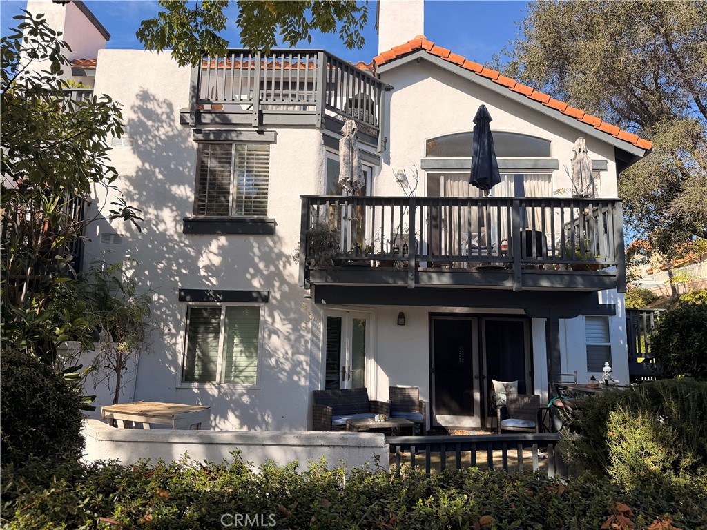 46 Celosia Rancho Santa Margarita, CA 92688 - Photo 15 of 39 a front view of a house with a porch