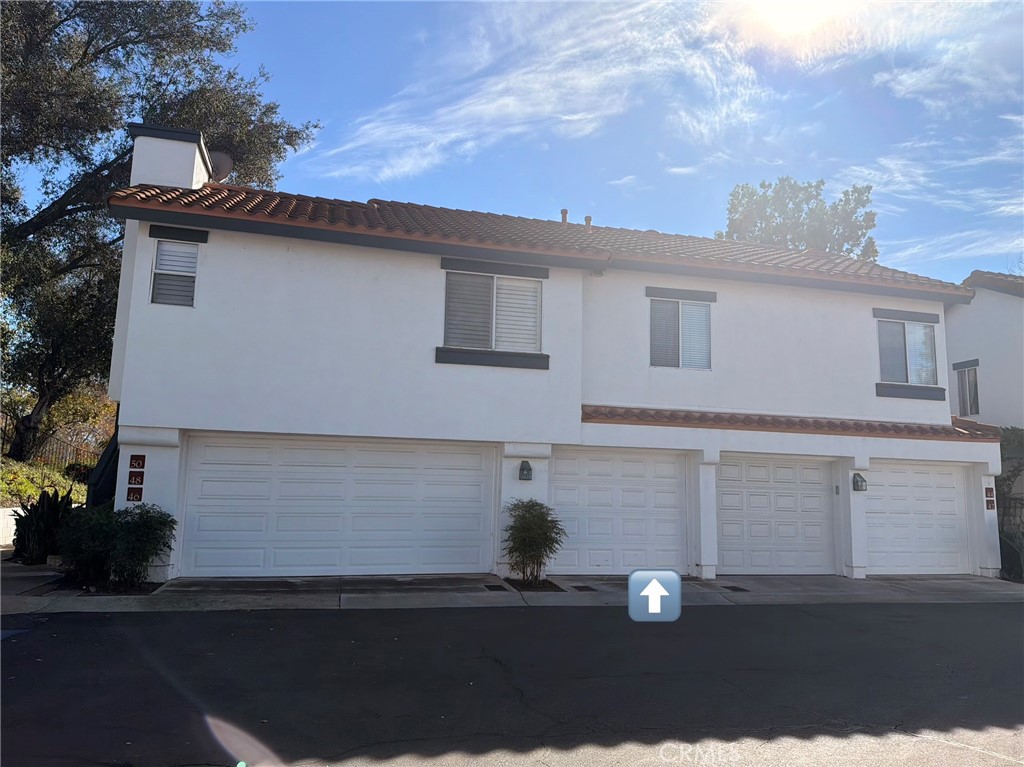 46 Celosia Rancho Santa Margarita, CA 92688 - Photo 30 of 39 a side view of a house with street