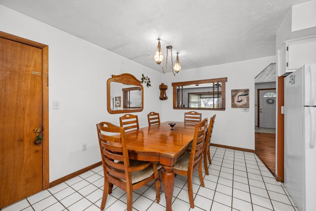 11213 22nd Street Milan, IL 61264 - Photo 22 of 36 a view of a dining room with furniture