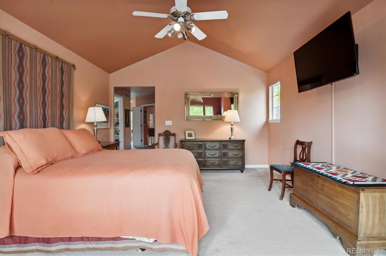 6381 Deframe Way Arvada, CO 80004 - Photo 18 of 22 a bedroom with bed tv and window