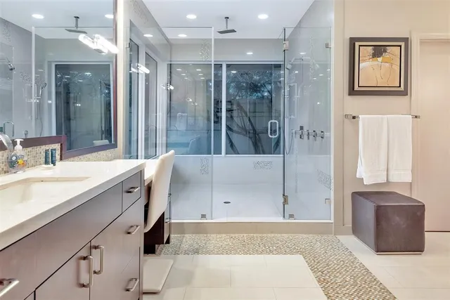 a bedroom with furniture and a walk in closet