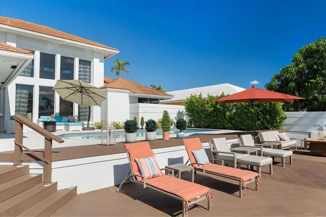 a view of a terrace with sitting area