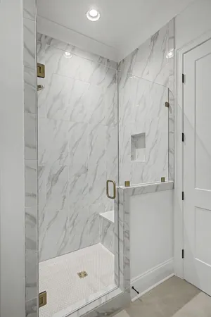 a living room with furniture fireplace and window