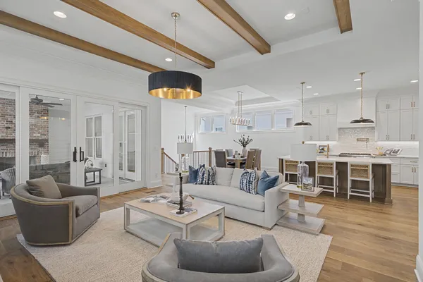 a kitchen with stainless steel appliances a refrigerator and cabinets