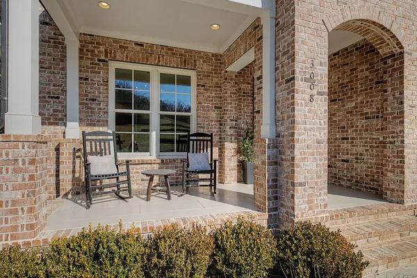 a view of staircase with wooden floor and stairs