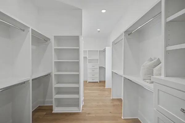 a bathroom with a shower and a bath tub