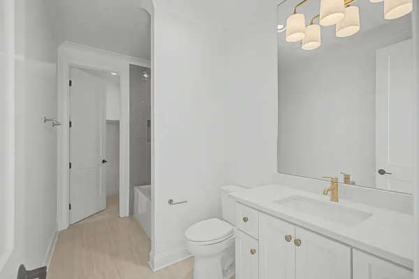 an empty room with a empty space and windows