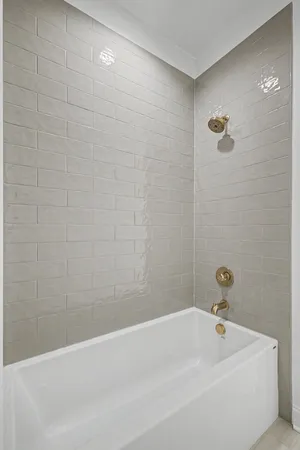 a view of a balcony with wooden floor