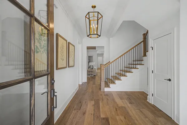 a bedroom with bed and a window