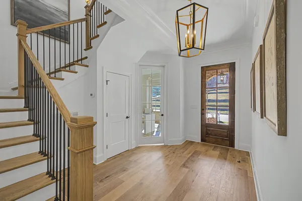a bathroom with a glass shower door