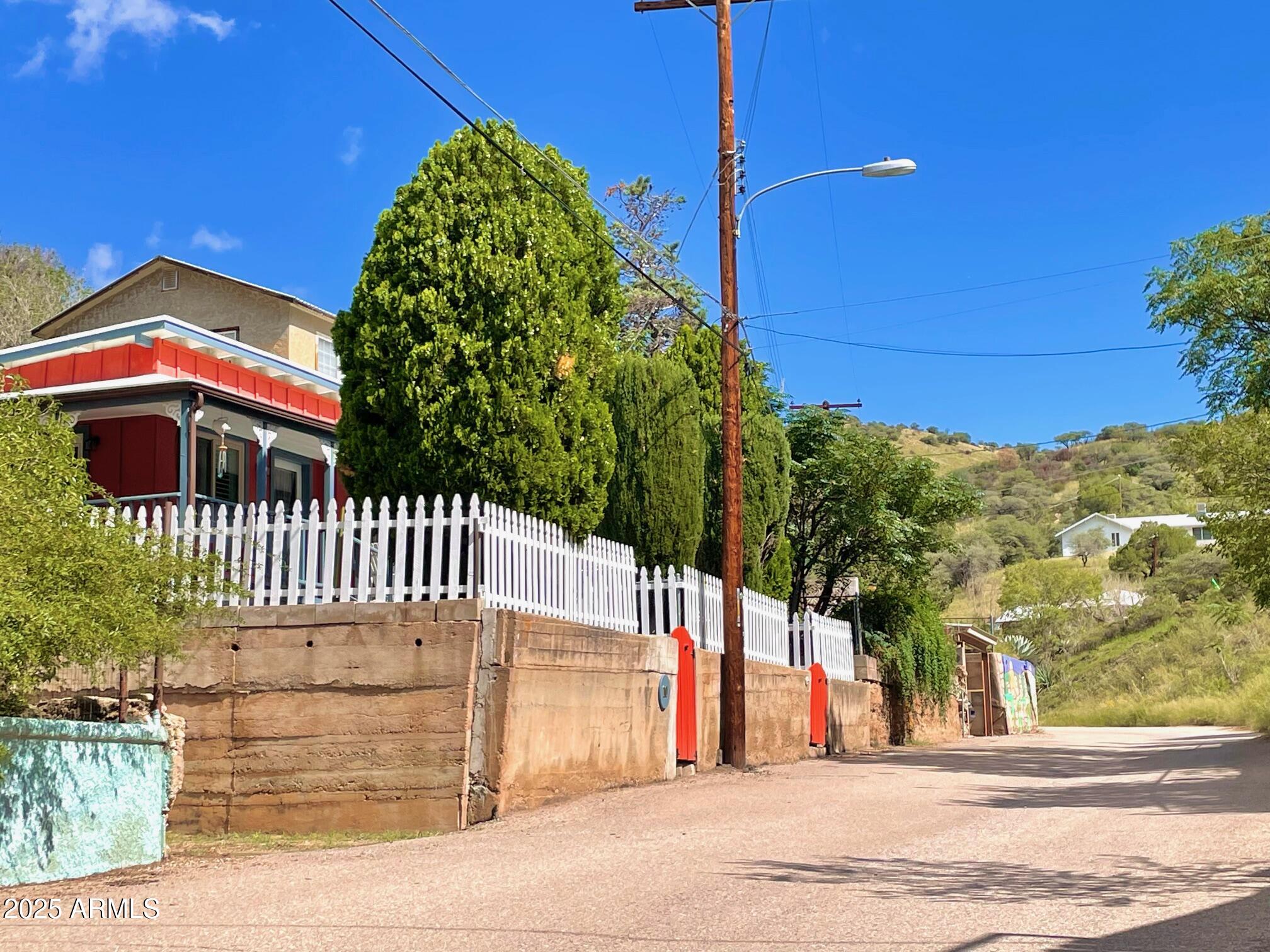 10 Locklin Avenue Bisbee, AZ 85603 - Photo 35 of 35 a view of a brick house with a street view