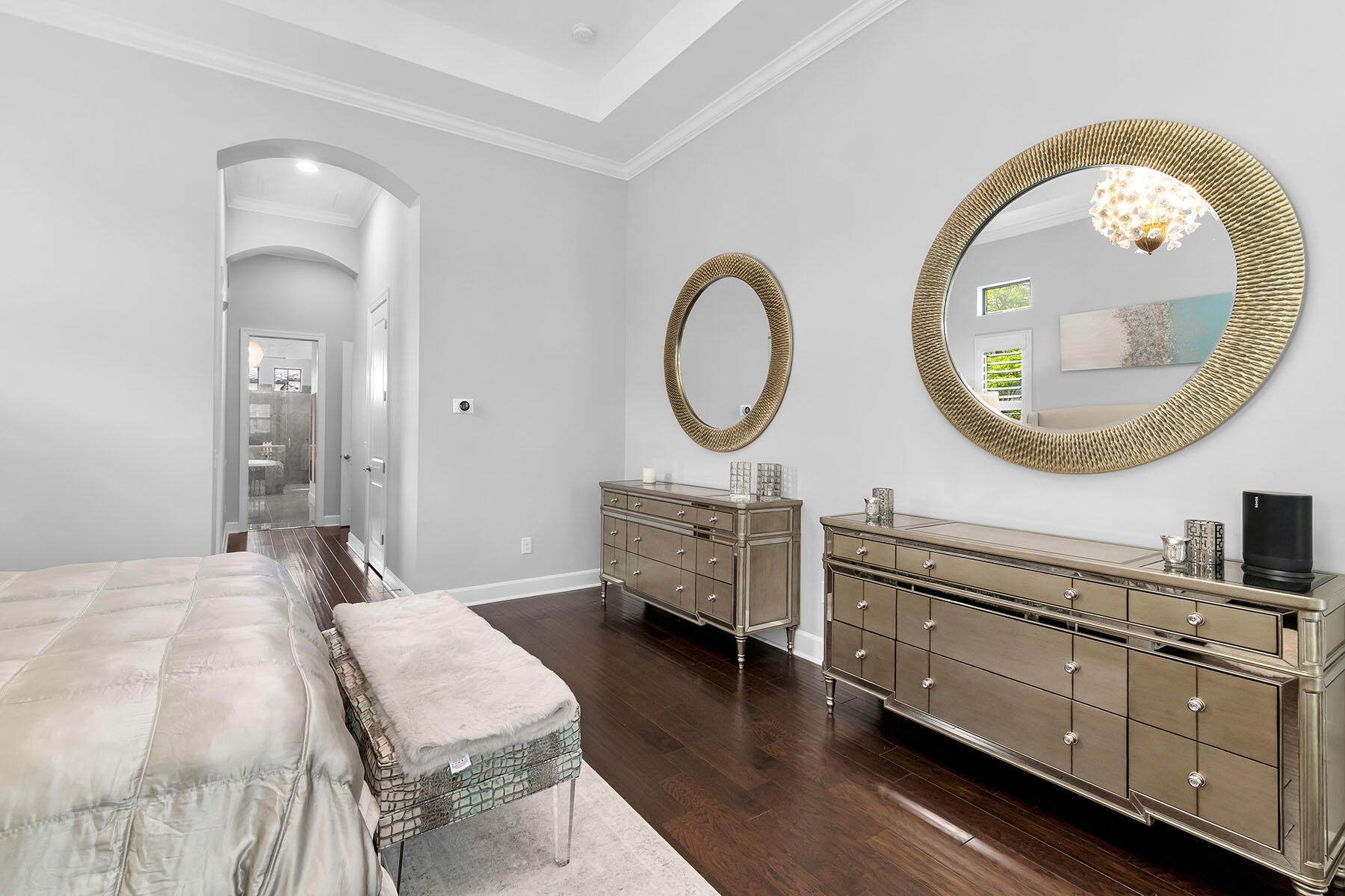 3193 Olympia Lane Naples, FL 34114 - Photo 17 of 50 a bedroom with a bed a mirror on dresser and a table