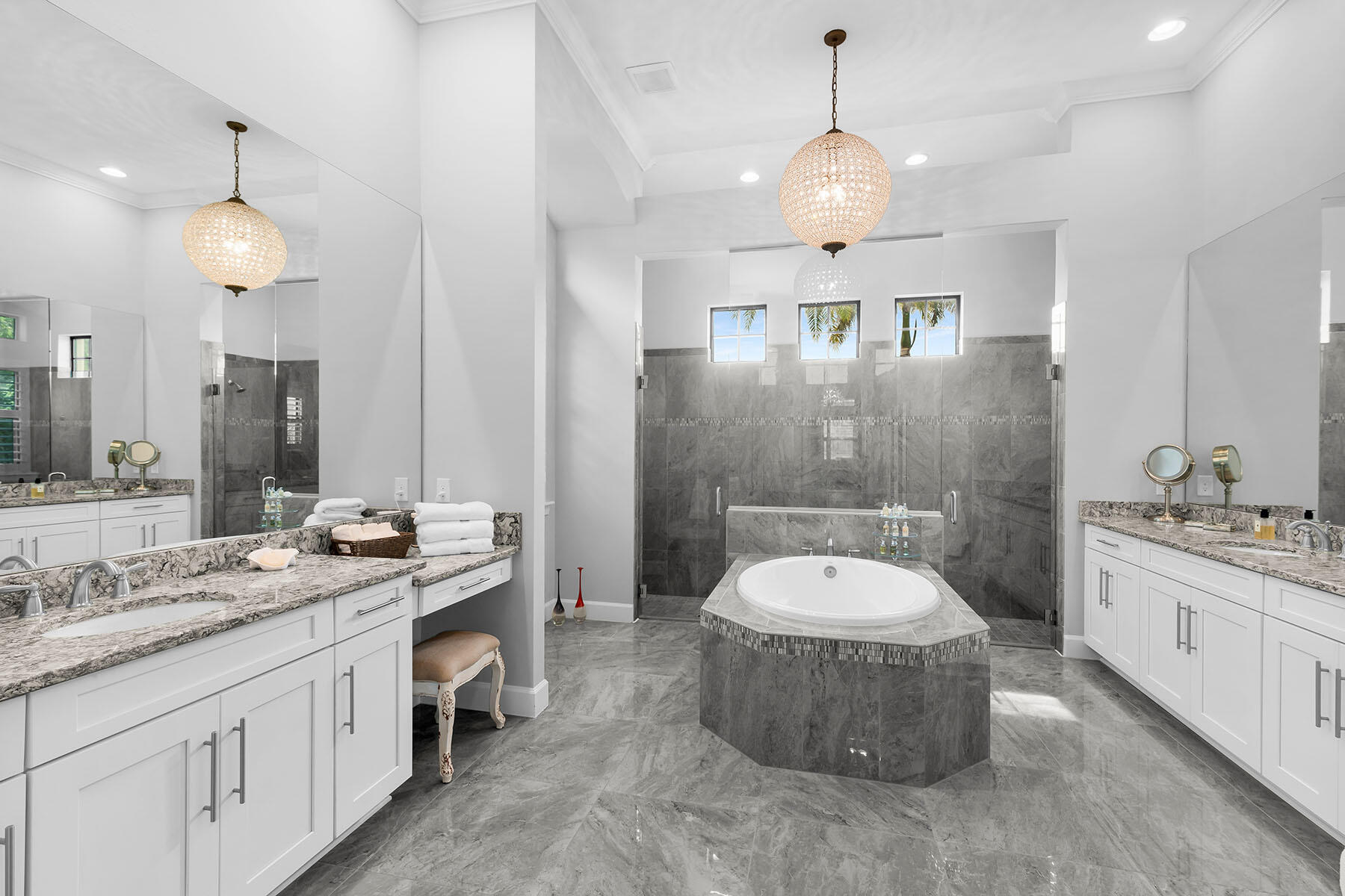 3193 Olympia Lane Naples, FL 34114 - Photo 18 of 50 a bathroom with a sink a toilet a mirror and vanity